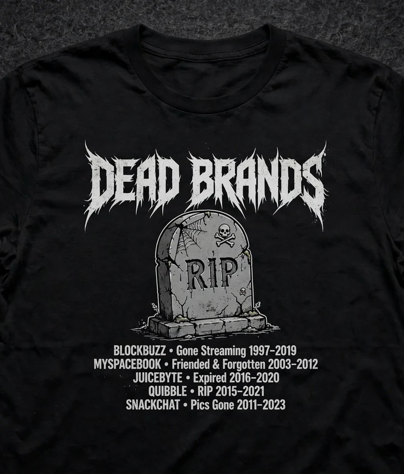 RIP Tombstone tee — black shirt with metal-lettered DEAD BRANDS over a cartoon tombstone of dead brands