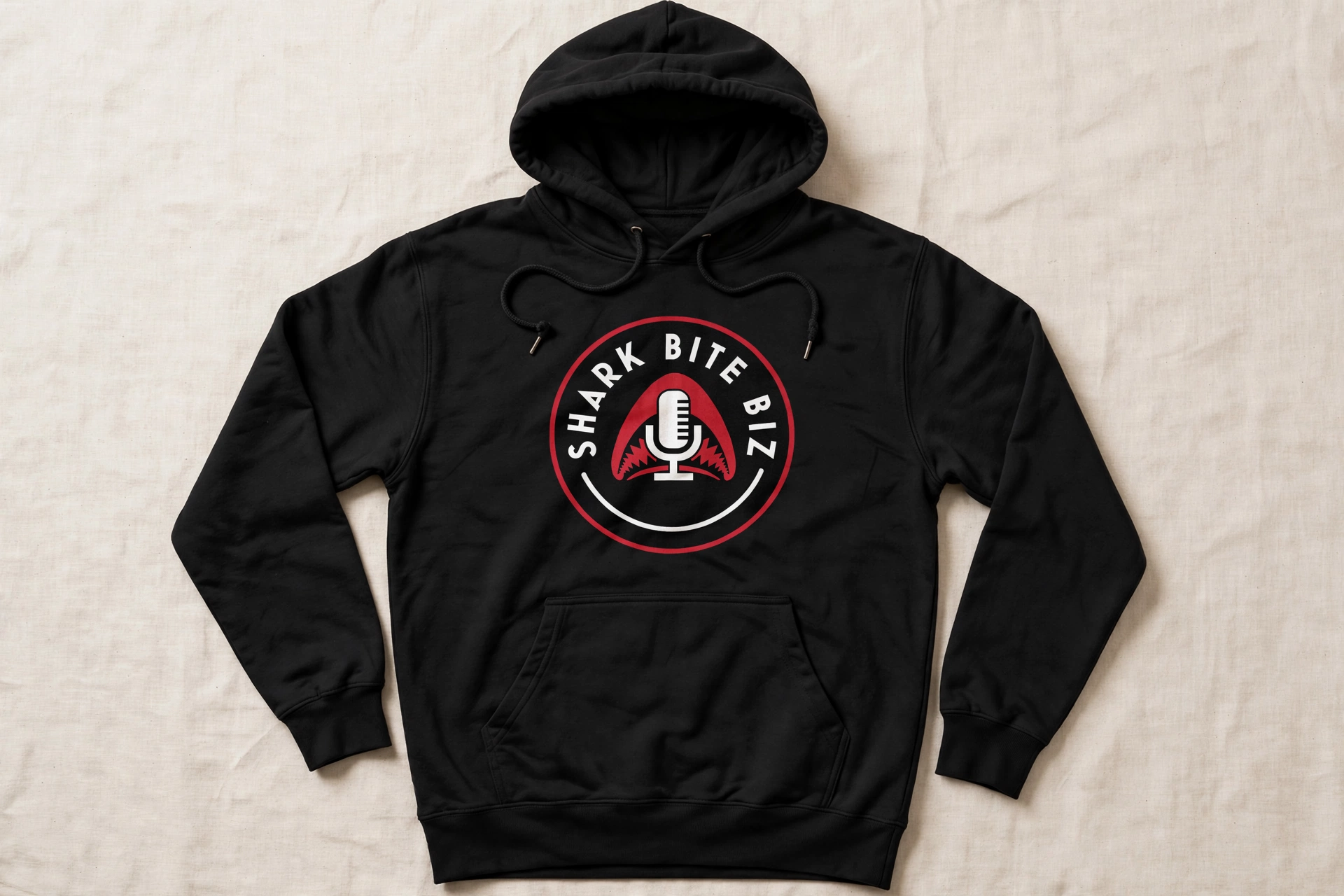 Shark Bite Biz hoodie — black pullover hoodie with the official Shark Bite Biz logo