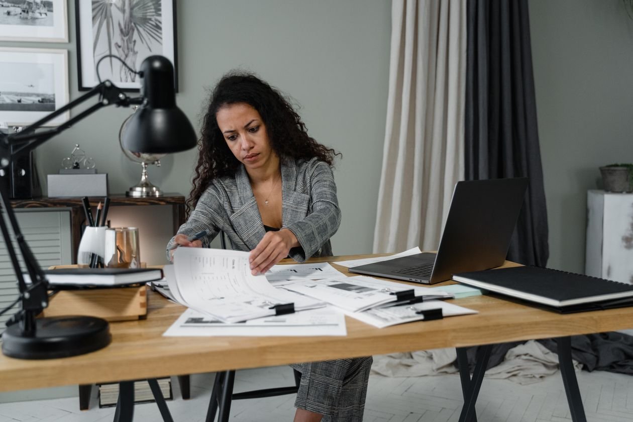 Sorting through paper invoices — the manual processes an ERP rescue cleans up