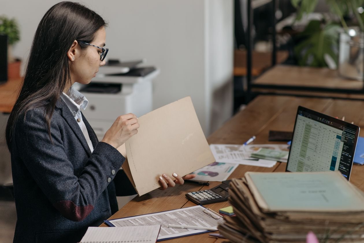 Spreadsheets, folders, and calculators — the manual month-end that ERP replaces