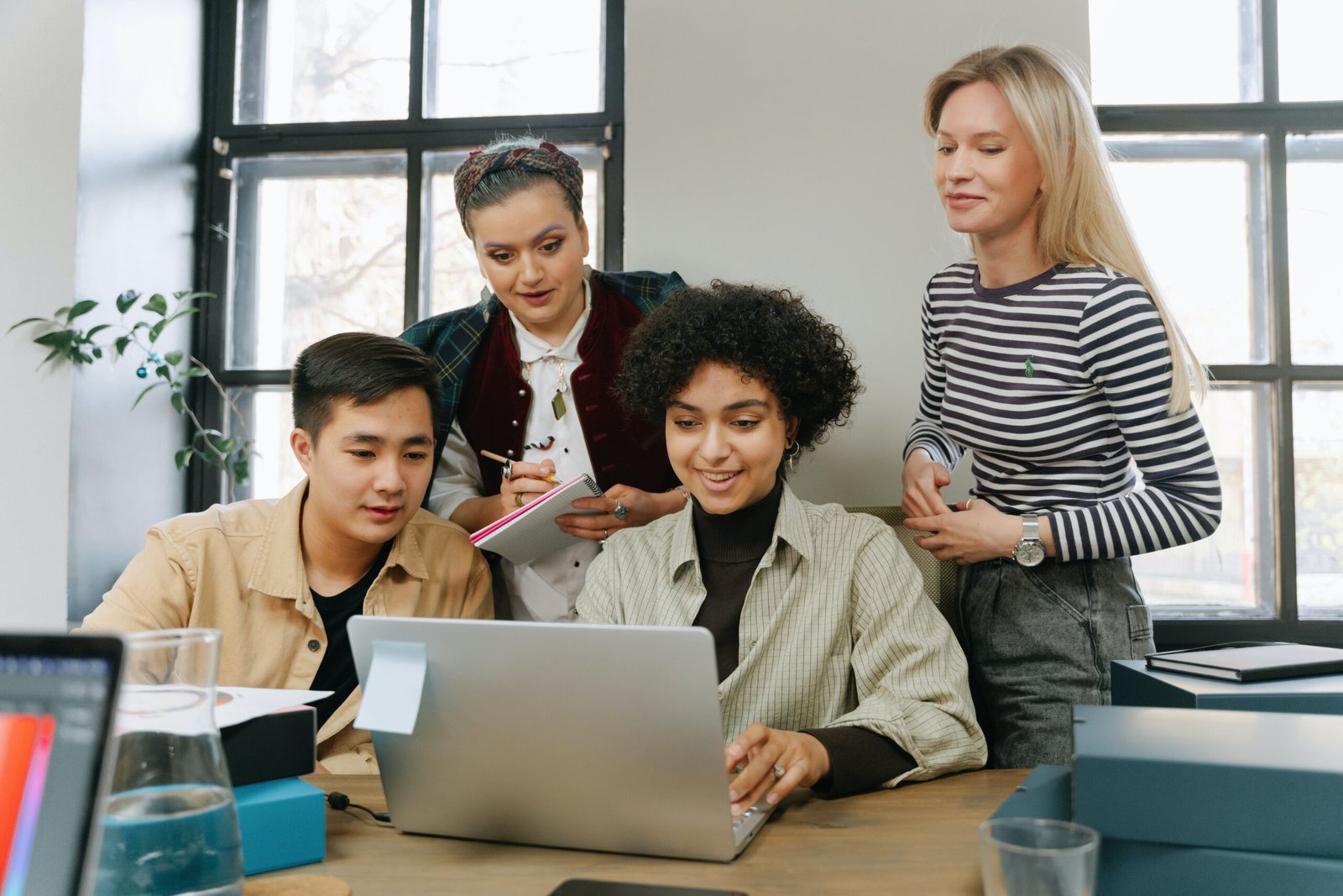 Small team collaborating around a table