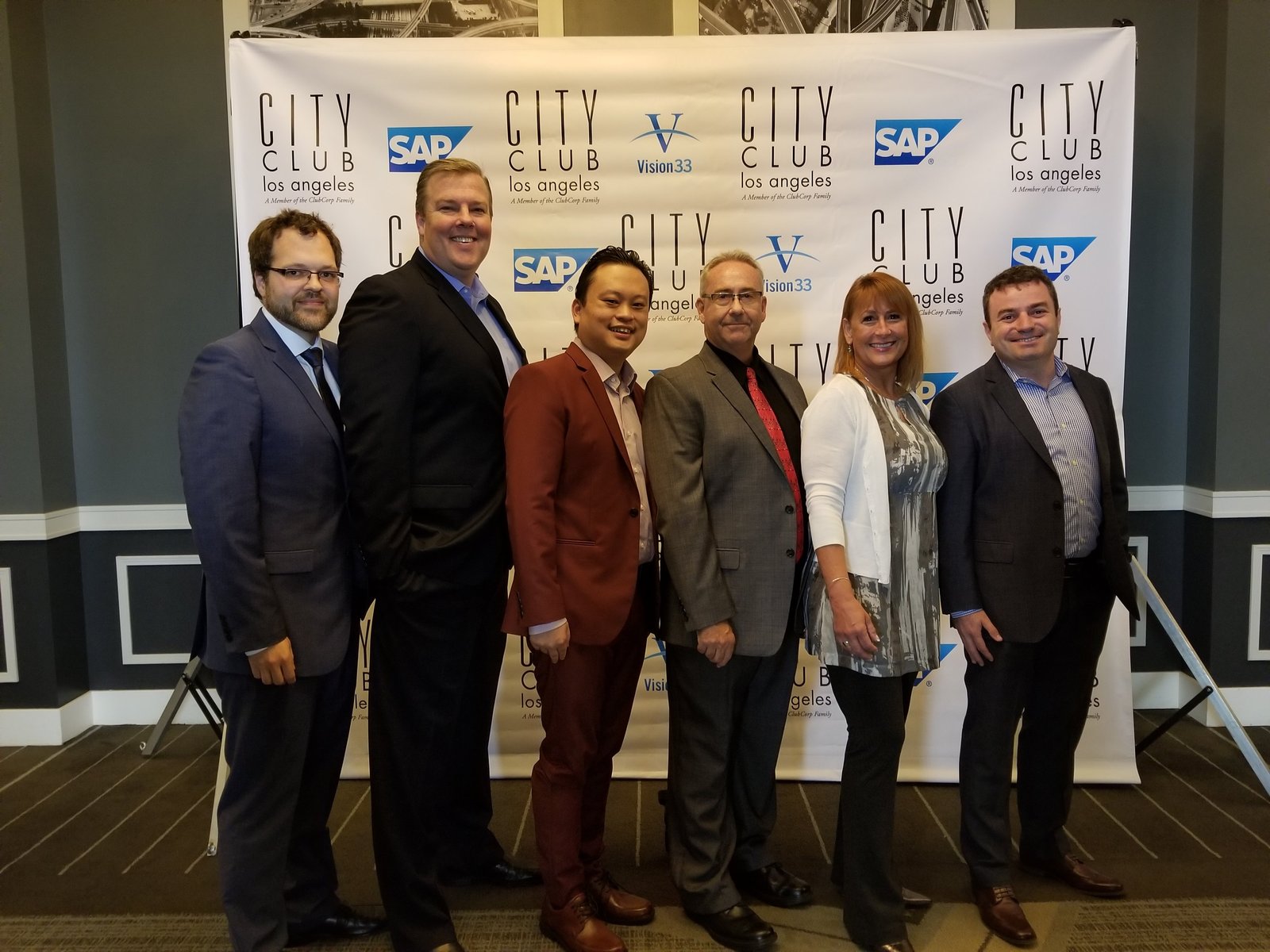 David Strausser with colleagues at an SAP and Vision33 event